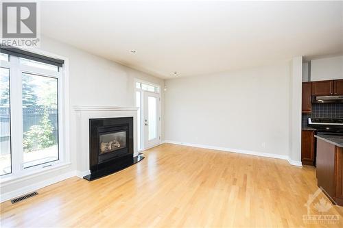 141 Manorhill Private, Ottawa, ON - Indoor With Fireplace