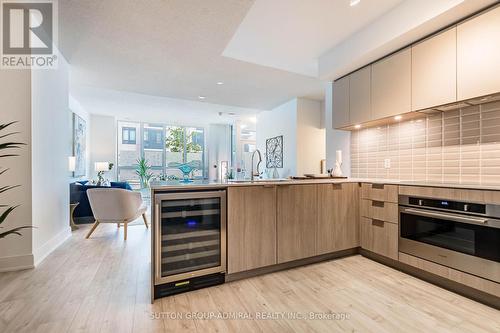 Th104 - 70 Annie Craig Drive, Toronto, ON - Indoor Photo Showing Kitchen With Upgraded Kitchen