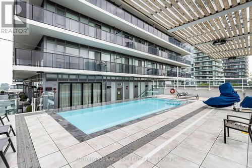 Th104 - 70 Annie Craig Drive, Toronto, ON - Outdoor With In Ground Pool