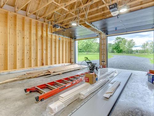 Garage - 117 Ch. Santerre, Sutton, QC - Indoor Photo Showing Garage