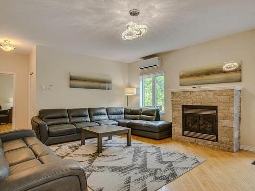 Living room - 2 Ch. Du Lac-Fiddler, Mille-Isles, QC - Indoor Photo Showing Living Room With Fireplace