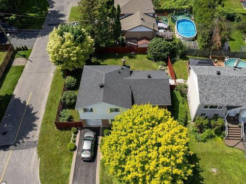 Aerial photo - 42 Rue Joseph-Paiement, Dollard-Des-Ormeaux, QC - Outdoor With Above Ground Pool