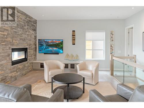 3434 Blue Grass Lane, Kelowna, BC - Indoor Photo Showing Living Room With Fireplace