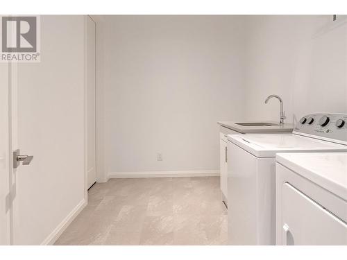 3434 Blue Grass Lane, Kelowna, BC - Indoor Photo Showing Laundry Room