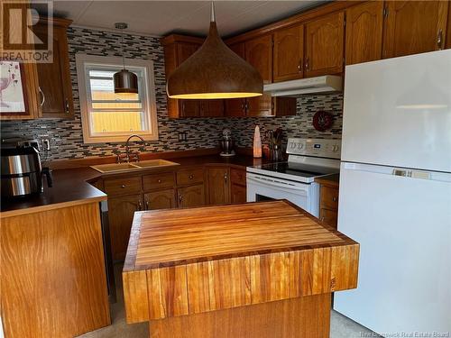 37 Parc Ptiso Street, Edmundston, NB - Indoor Photo Showing Kitchen With Double Sink