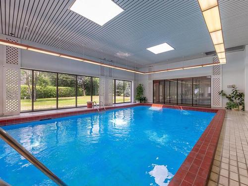 Piscine - 104-21 Ch. Du Bord-Du-Lac-Lakeshore, Pointe-Claire, QC - Indoor Photo Showing Other Room With In Ground Pool