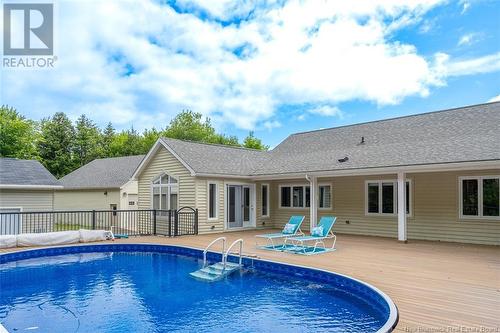 32 Chateau Drive, Mcleod Hill, NB - Outdoor With Above Ground Pool With Deck Patio Veranda