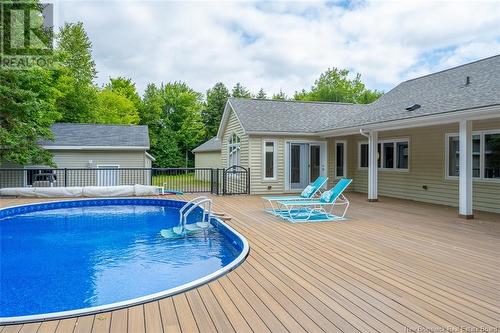 32 Chateau Drive, Mcleod Hill, NB - Outdoor With Above Ground Pool With Deck Patio Veranda With Exterior