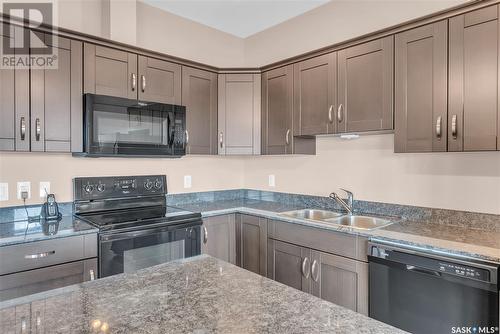 301 714 Hart Road, Saskatoon, SK - Indoor Photo Showing Kitchen With Double Sink