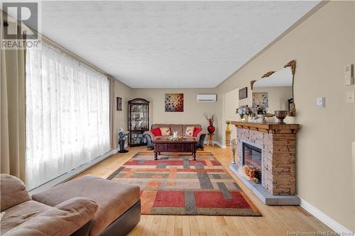 119 Doncaster Drive, Quispamsis, NB - Indoor Photo Showing Living Room With Fireplace