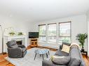 201-755 Goldstream Ave, Langford, BC  - Indoor Photo Showing Living Room With Fireplace 