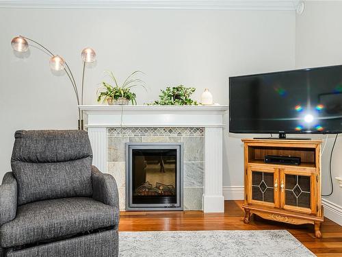 201-755 Goldstream Ave, Langford, BC - Indoor Photo Showing Living Room With Fireplace