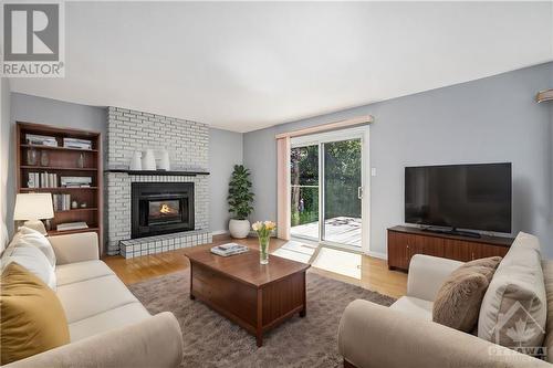 Virtually Staged - 963 Chaleur Way, Ottawa, ON - Indoor Photo Showing Living Room With Fireplace