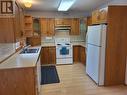 6184 Saint Martin Place, Oliver, BC  - Indoor Photo Showing Kitchen With Double Sink 