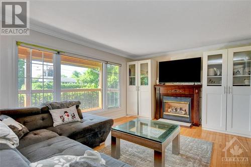 7069 Marco Street, Ottawa, ON - Indoor Photo Showing Living Room With Fireplace
