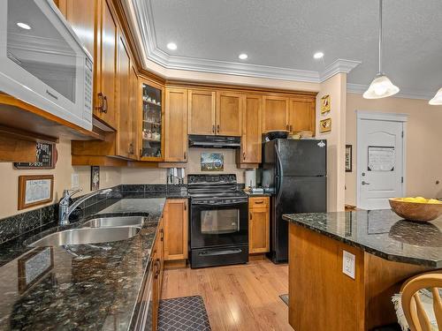 311-3666 Royal Vista Way, Courtenay, BC - Indoor Photo Showing Kitchen With Double Sink