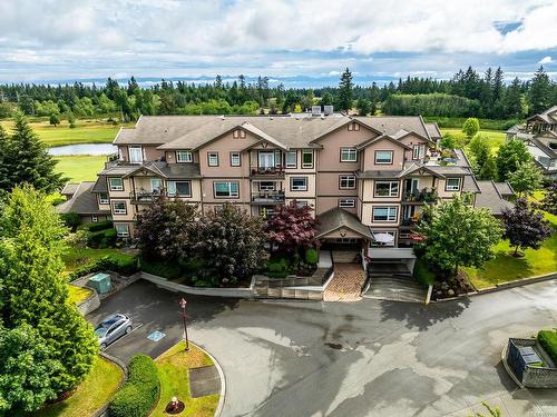 311-3666 Royal Vista Way, Courtenay, BC - Outdoor With Facade