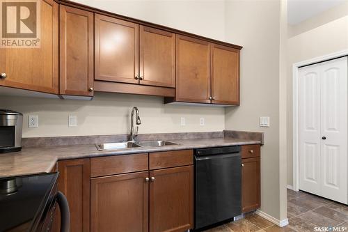 402E 1300 Stockton Street N, Regina, SK - Indoor Photo Showing Kitchen With Double Sink