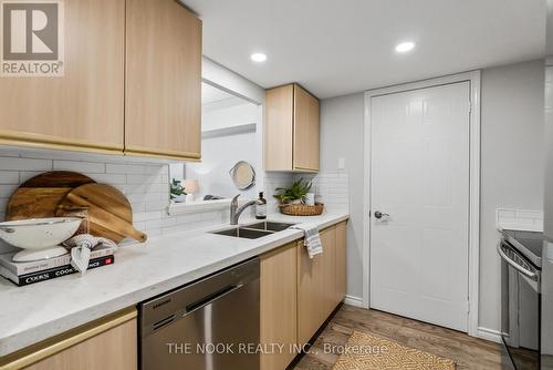 101 - 95 Wellington Street, Clarington, ON - Indoor Photo Showing Kitchen With Double Sink