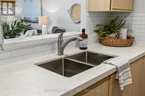 101 - 95 Wellington Street, Clarington, ON - Indoor Photo Showing Kitchen With Double Sink
