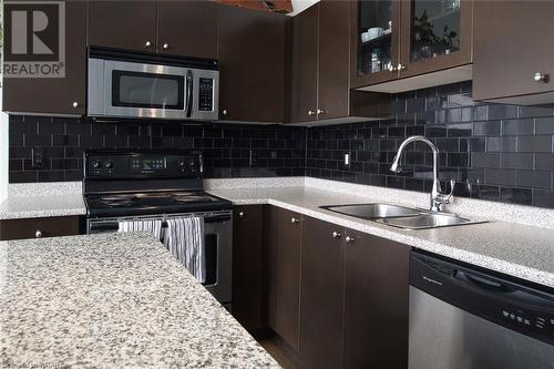404 King Street W Unit# 417, Kitchener, ON - Indoor Photo Showing Kitchen With Double Sink