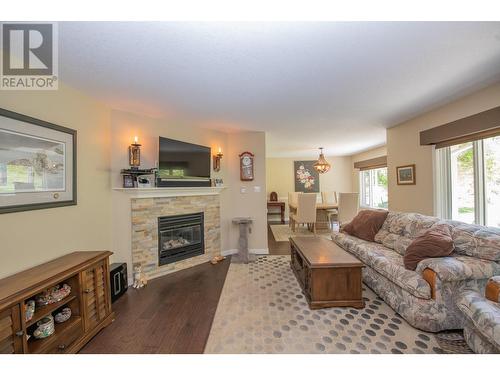 7377 Mckoryk Road, Vernon, BC - Indoor Photo Showing Living Room With Fireplace