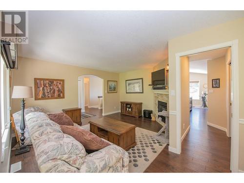 7377 Mckoryk Road, Vernon, BC - Indoor Photo Showing Living Room With Fireplace