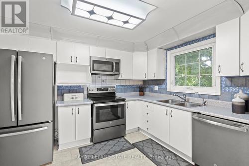 665 Nash Road N, Hamilton, ON - Indoor Photo Showing Kitchen With Double Sink