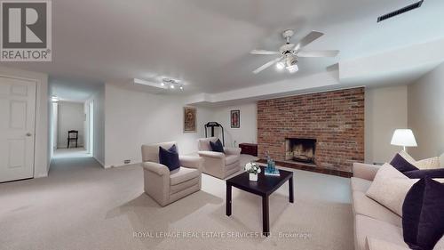 61 James Foxway, Toronto, ON - Indoor Photo Showing Living Room With Fireplace