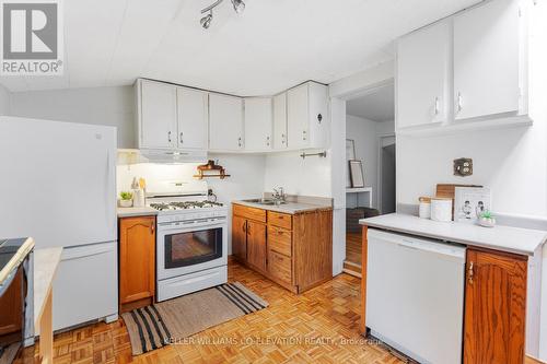 297 St Helens Avenue, Toronto, ON - Indoor Photo Showing Kitchen With Double Sink