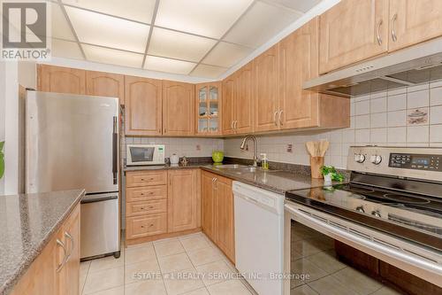 802 - 3590 Kaneff Crescent, Mississauga, ON - Indoor Photo Showing Kitchen With Double Sink