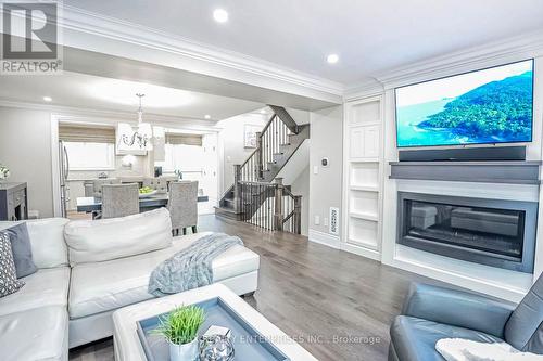 44 - 1060 Walden Circle, Mississauga, ON - Indoor Photo Showing Living Room With Fireplace