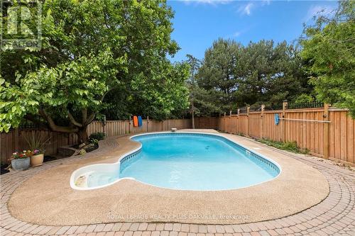 1297 Golden Meadow Trail, Oakville, ON - Outdoor With In Ground Pool With Backyard