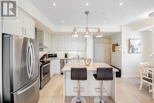 1 - 125 Long Branch Avenue, Toronto, ON - Indoor Photo Showing Kitchen With Stainless Steel Kitchen With Upgraded Kitchen