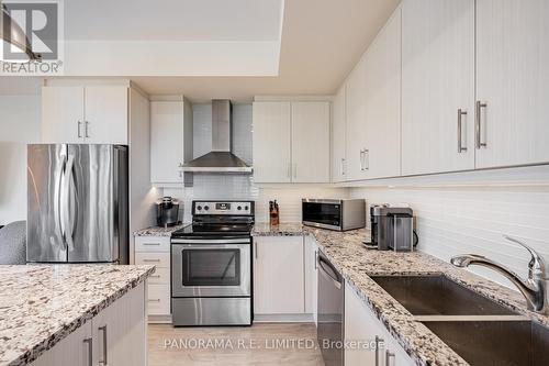 1 - 125 Long Branch Avenue, Toronto, ON - Indoor Photo Showing Kitchen With Stainless Steel Kitchen With Upgraded Kitchen