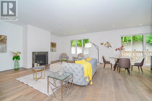 23 Blueking Crescent, Toronto, ON - Indoor Photo Showing Living Room With Fireplace