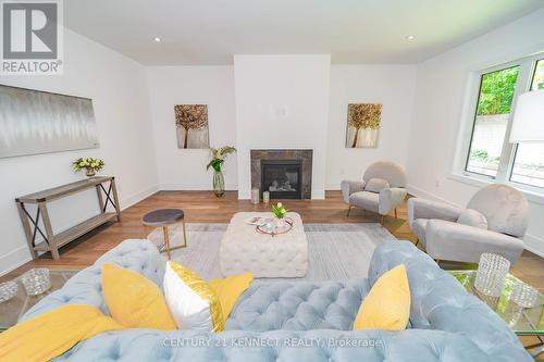 23 Blueking Crescent, Toronto (Rouge), ON - Indoor Photo Showing Living Room With Fireplace