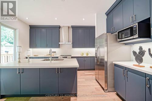 23 Blueking Crescent, Toronto, ON - Indoor Photo Showing Kitchen With Double Sink