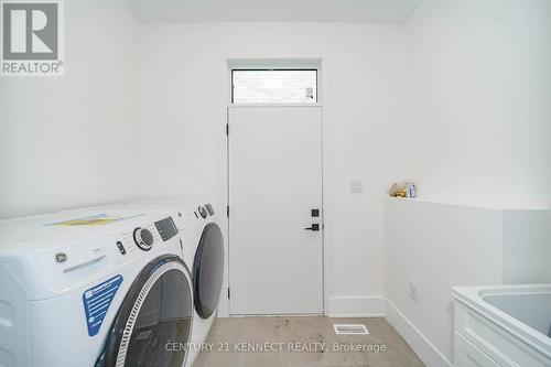 23 Blueking Crescent, Toronto, ON - Indoor Photo Showing Laundry Room