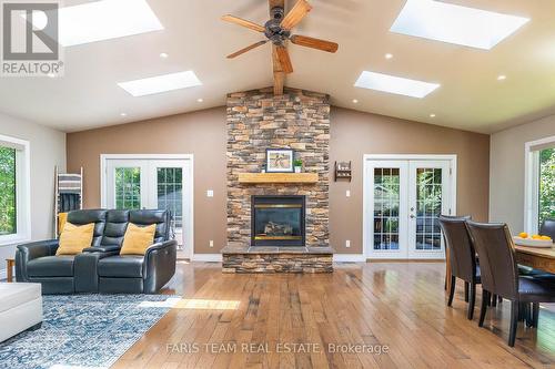 964 Corner Avenue, Innisfil, ON - Indoor Photo Showing Living Room With Fireplace