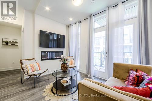 9 - 8 Sayers Lane, Richmond Hill, ON - Indoor Photo Showing Living Room With Fireplace