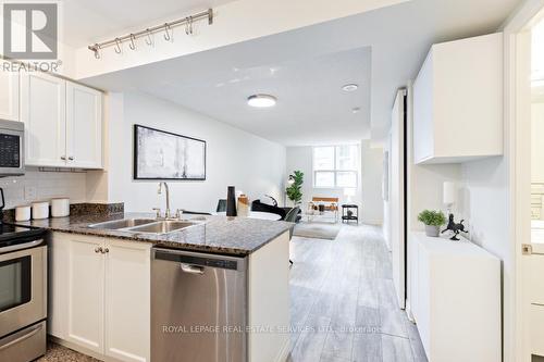 451 - 313 Richmond Street E, Toronto, ON - Indoor Photo Showing Kitchen With Double Sink