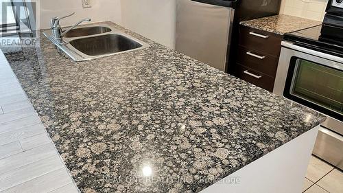 907 - 38 Grenville Street, Toronto, ON - Indoor Photo Showing Kitchen With Double Sink