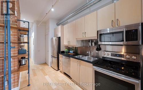 213 - 81A Front Street E, Toronto, ON - Indoor Photo Showing Kitchen With Double Sink
