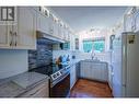 799 Creekside Road Unit# 4, Penticton, BC  - Indoor Photo Showing Kitchen With Double Sink With Upgraded Kitchen 