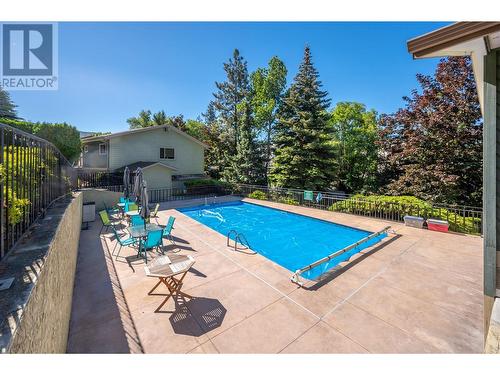 799 Creekside Road Unit# 4, Penticton, BC - Outdoor With In Ground Pool With Backyard