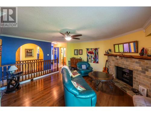 799 Creekside Road Unit# 4, Penticton, BC - Indoor Photo Showing Living Room With Fireplace