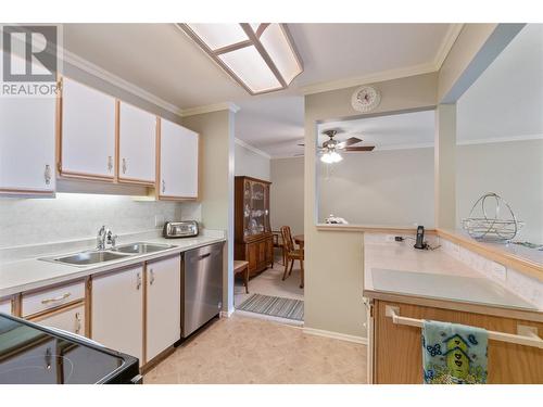 180 Hollywood Road N Unit# 211, Kelowna, BC - Indoor Photo Showing Kitchen With Double Sink