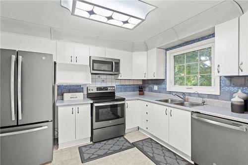 665 Nash Road N, Hamilton, ON - Indoor Photo Showing Kitchen With Double Sink