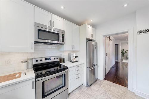 Virtually Staged - 88 Gibson Avenue, Hamilton, ON - Indoor Photo Showing Kitchen With Stainless Steel Kitchen